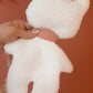 Doudou plat renard en Sherpa lait et gaze de coton à motifs.